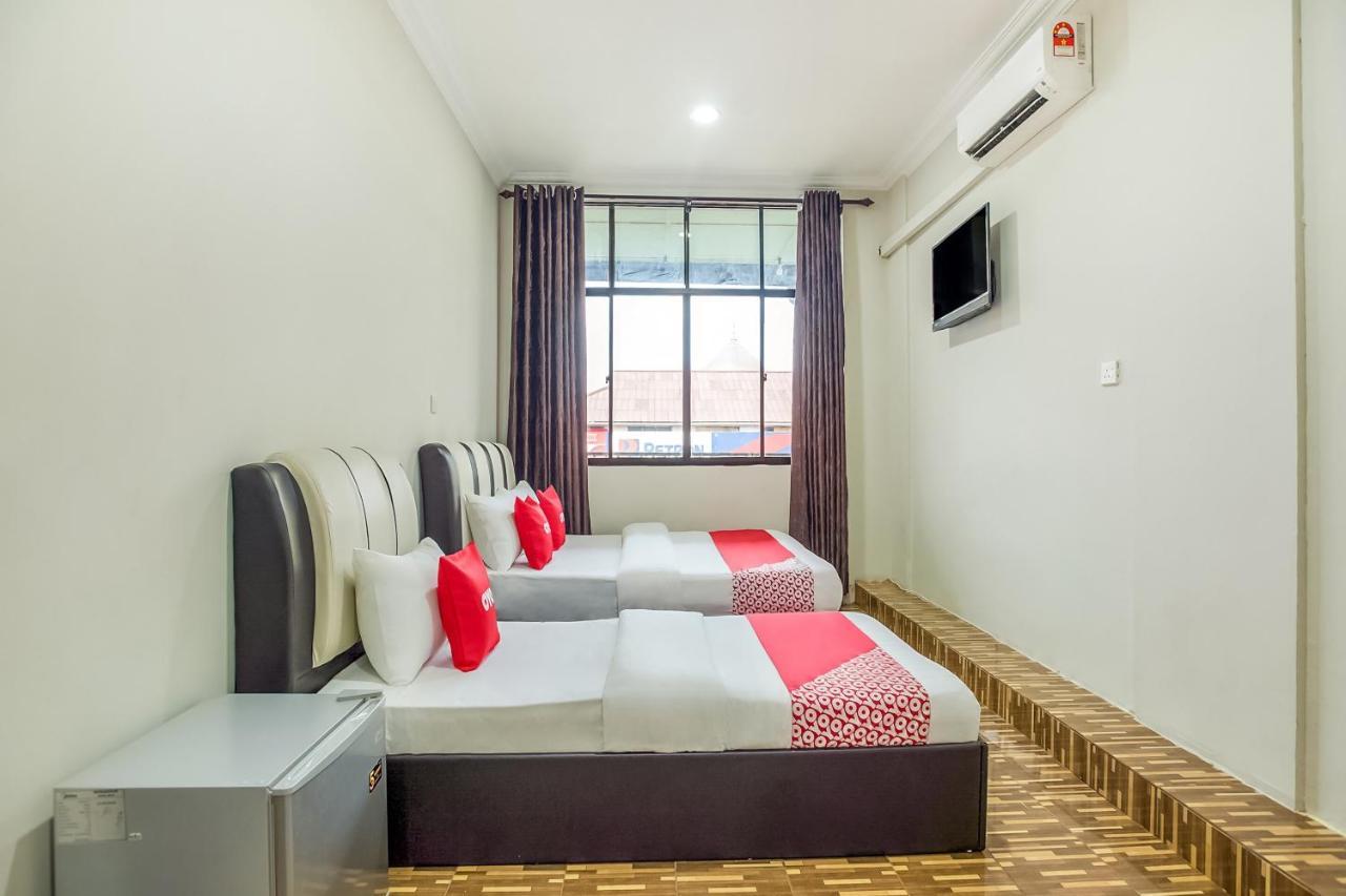 Oyo 89712 Grand Inn Semporna Esterno foto